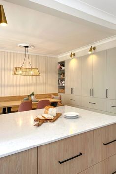 the kitchen is clean and ready to be used for cooking or baking, with no one in it