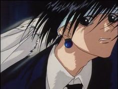 an anime character with black hair and blue eyes