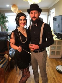 a man and woman dressed up in costumes