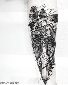 a black and white photo of a tattoo on the arm with an image of a person holding