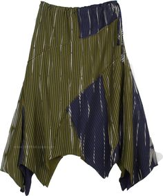 An everyday fun lightweight cotton asymmetrical hem hippie patchwork skirt. It has a vertical pattern across the fabric giving the skirt more color. The patchwork is in two kinds of colors - Dark green or Henna and blue color in a similar print. The side zipper and a drawstring on the waist ties to the side and gives the skirt flexibility across an extra small to a medium waist. The material is very light cotton, that will be perfect for inland heat in the summers. This skirt has a free fall tha Bohemian Cotton Skirt With Handkerchief Hem, Bohemian Cotton Skirt With Asymmetrical Hem, Bohemian Relaxed Skirt With Asymmetrical Hem, Bohemian Cotton Bottoms With Asymmetrical Hem, Casual Skirt With Patchwork And Asymmetrical Hem, Casual Patchwork Skirt With Asymmetrical Hem, Casual Skirt With Asymmetrical Hem And Patchwork, Bohemian Skirt With Asymmetrical Hem And Lined Detail, Bohemian Skirt With Asymmetrical Hem And Lining