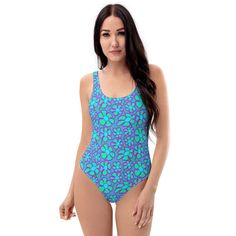 Bright, retro-styled flowers greet the onlooker with striking colour and cuteness from this fab, all-over printed swimming costume. This one-piece swimsuit for all figures will bring out your best features. Enjoy the smooth fabric and the flattering design, and show it off by the sea or pool! * 82% Polyester, 18% Spandex * Fabric weight: 6.61 oz/yd² (224 g/m²) * Chlorine-resistant fabric * Cheeky fit with a scoop neckline and a low scoop back * Zig-zag stitching * Double-layer front * Four-way stretch material stretches and recovers on the cross and lengthwise grains Retro One-piece Printed Swimwear, Retro Print Beachwear Swimwear For Poolside, Beachwear Swimwear With Retro Print For Poolside, Retro Blue Printed Swimwear, Playful Purple Swimwear For Swimming, Playful Fitted Swimwear With Floral Print, Playful Blue Summer Bodysuit, Fitted Playful Floral Print Swimwear, Playful Fitted Floral Print Swimwear