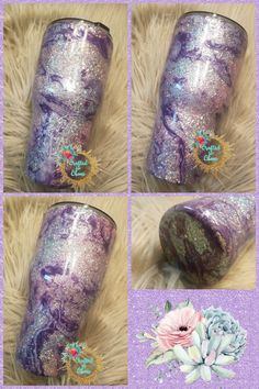 purple and silver glitter tumbler cup with flowers on the side, sitting on a furry surface