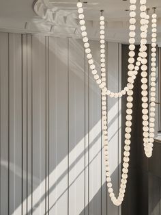 a white chandelier hanging from the ceiling