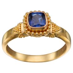 A top grade 5 mm cushion cut blue sapphire is highlighted by large and small surrounding "jawan" in this 100% handmade high karat gold beauty. A really nice weight and feel to this one. This ring is currently sized 6.5. It is resizable. Sweet! 22k Gold Ring, Gold Beauty, Grade 5, 22k Gold, Cushion Cut, Blue Sapphire, Gold Ring, Fashion Rings, Really Cool Stuff