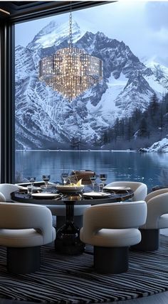 a dining room with a chandelier hanging from the ceiling