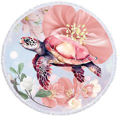 a round beach towel with a turtle and flowers on it