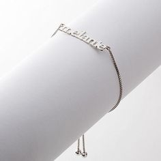 Sterling Silver Adjustable Name Bracelet Add some glam to your look! Featuring your name or a loved one's name in sterling silver script, this beautiful bracelet is the perfect addition to any jewelry lover's collection. Personalize this piece for your own collection, or give it to a loved one as a thoughtful gift. Design Information Adjustable length sterling silver bracelet has personalized name at center Good to Know Personalize with a name up to 8 characters. Elegant Nameplate Bracelet With Adjustable Chain, Personalized Elegant Name Bracelet For Friendship, Adjustable Silver Jubilee Name Bracelet, Silver Personalized Name Bracelet For Friendship, Sterling Silver Name Bracelet For Friendship, Silver Name Bracelet For Friendship, Silver Nameplate Friendship Jewelry, Silver Nameplate Jewelry For Friendship, Adjustable Chain Bracelet With Custom Name