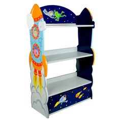 A Fantasy Fields Kids Wooden Outer Space Bookshelf with Drawer, Blue from the Outer Space collection, with rocket ships, astronauts, stars, comets and aliens illustrated on the shelving unit. Space Bookshelf, Fantasy Fields, Unicornios Wallpaper, 3 Shelf Bookcase, Playroom Storage, Kids Bookcase, Bookshelves Kids, Wooden Bookcase, Rocket Ship