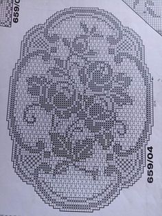 a cross stitch pattern on top of a piece of paper