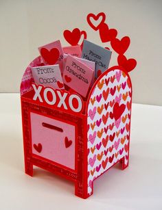 a valentine's day card box with hearts on the top and an xoxo in the bottom