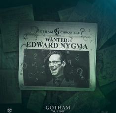 the poster for edward nygma's upcoming show is displayed in front of many papers