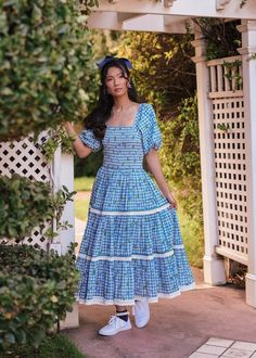 Sweet As A Berry This blueberry-printed midi compliments the skies and clouds in its adorable blue gingham. The flirty design and playful fabric make it a delightful choice for picnics, garden strolls, or any sunny-day adventure. Smocked bodice Square neckline Elastic puff sleeves Pockets Runs big, recommend sizing dow Blue Gingham, Sky And Clouds, Blue Berry Muffins, Sunny Days, Smocking, Gingham, Design Crafts, Puff Sleeve, Bodice