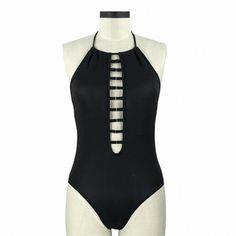 Black Backless Lace Up One Piece Swimsuit – IRHAZ One-piece Lined Swimwear For Club, Solid Color Bodysuit For Club And Beach Season, Black Bodysuit For Club And Beach Season, One-piece Swimwear For Club And Beach Season, Black Backless One Piece For Beach Season, Black Backless One-piece For Poolside, Black Backless One Piece For Poolside, Black Backless One-piece For Pool, Black Backless One Piece For Pool