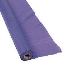 a purple yoga mat rolled up on a white background