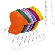 the hat rack is holding six hats and four pairs of ear hooks for each cap