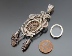 "Late 19th Century, 1880- 1890. Italian locket pendant in 900 silver. CONDITION: Very good antique condition as seen. Glass intact. Locket closes fine. MEASUREMENTS: with bail 3 3/8\" x 1 1/8\" (85 x 28mm). Weight: 12,3g. * * * All our items are packed in gift boxes, easy to check of content and re-pack. If you wish something special, please let us know. * * * LAYAWAYS: All items can be put on layaway, max 4 months. First payment should be no less than 1/4 of total price including non-refundable Crystal Locket, Christmas Bling, Victorian Locket, Glass Locket, Photo Pendant, Puffy Heart, Grand Tour, Antique Photos, Heart Locket