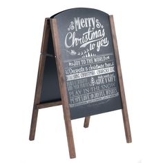 a chalkboard sign with the words merry christmas to you written in white on it