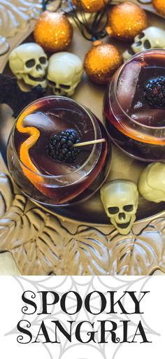 the cover of spooky sangria with skulls and fruit