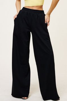 Wide leg casual sweat pants. High waisted with elastic band. Raw edge finish Fabric & fit: Model is wearing size Small. Mochila Jansport, Comfy Lounge Pants, Cozy Pants, Black Sweats, Wide Leg Sweatpants, Casual Sweatpants, Black Sweatpants, Grey Sweatpants, Sweat Pants