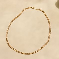 Our 14K Yellow Gold Figaro Chain Choker is the perfect chunky layering choker to add to your neck stack. In Solid Gold, it's a substantial chain that will last you a lifetime. Gold KT: 14K Solid Gold Gold Color: Yellow Gold Choker Length: 14" or 15" Chain Width: 3mm Chain Style: Italian Figaro Chain Clasp Closure: Lobster Claw Gold Plated Figaro Chain Choker, Gold-plated Figaro Chain Choker, Yellow Gold Figaro Chain Choker Necklace, Yellow Gold Chain Choker, Everyday Yellow Gold Choker With Gold Chain, Yellow Gold Chunky Chain Choker Necklace, Gold Plated Figaro Chain Choker Necklace, Everyday Gold Chain Choker, Neck Stack