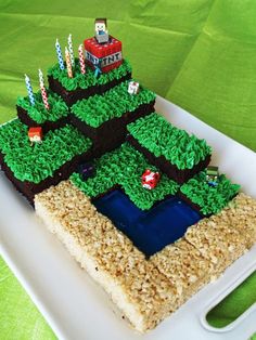 a cake made to look like a farm scene on top of rice krispy kreme