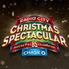 radio city christmas spectacular logo with snowflakes and stars in the sky behind it