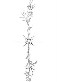 a cross with flowers and leaves on it