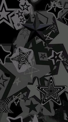 an abstract black and white background with many different stars in the middle, including one star