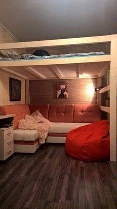 a loft bed with a couch underneath it