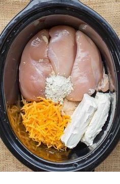 chicken, cheese and other ingredients in an instant pot for the slow cooker meal