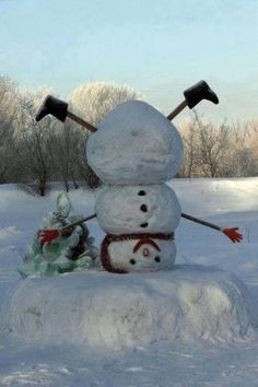 there is a snowman with two axes on his head