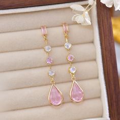 Add a gorgeous touch to your fits with these stunning pink teardrop gem earrings, perfect for spring and summer outfits! 💎 Materials: 14k Gold Electroplated - more durable than regular platings Sterling Silver Earring Posts - Hypoallergenic Cubic Zirconia Spring And Summer Outfits, Gem Earrings, Earring Posts, Silver Earring, Diamond Crystal, Ring Bracelet, Earring Necklace, Artisan Jewelry, Ring Necklace