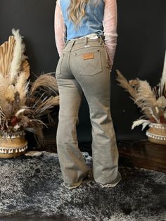 Wrangler Carly Olive Fray Hem Flare Women's Jeans Mid-rise Bottoms For Fall Rodeo, Western Jeans With Standard Cut Leg For Fall, Mid-rise Cotton Bottoms For Rodeo, Western Jeans Standard Cut For Fall, High Rise Jeans For Fall Rodeo, High-rise Jeans For Rodeo In Fall, High Rise Jeans For Rodeo In Fall, Western Style Cotton Jeans For Rodeo, Western Style Mid-rise Cotton Bottoms