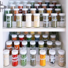 an open refrigerator filled with lots of different types of spices