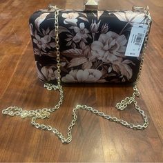 Express Nwt Floral Stud Clasp Clutch This Floral Clutch Bag Is A Chic Accessory For A Night On The Town. Perfect For Carrying Your Essentials, This Bag Is A Must Have That Is Sure To Turn Heads. Rectangular Floral Print Shoulder Bag For Evening, Chic Evening Bags With Floral Print, Elegant Evening Bags With Floral Print, Elegant Floral Print Evening Bags, Elegant Black Bags With Floral Print, Chic Formal Bags With Floral Print, Chic Formal Bag With Floral Print, Elegant Party Bag With Floral Print, Floral Clutches