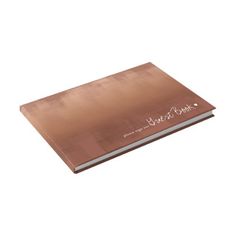 a brown notebook with writing on it