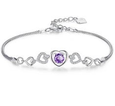 This heart bracelet is a magnificent piece. Crafted in sterling silver over brass , the bracelet will add a touch of elegance and class to your outfit.it is a versatile accessory that can be paired with all casual and formal wear it future a spring ring closure for easy use and makes a great gift . Purple amethyst stone , sterling silver , 7.5 intch Excellent quality you will be very proud of this bracelet Made in USA exclusively by Theo Doro Amethyst Crystal Bracelet, Purple Bracelet, Jewelry Safe, Crystal Bracelet, Diamond Bracelets, Amethyst Stone, Crystal Heart, Heart Bracelet, Amethyst Crystal