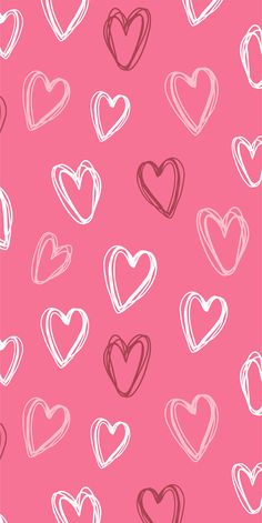 a pink background with hearts drawn on it