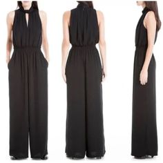 Elevate Your Wardrobe With This Stunning Black Jumpsuit From Max Studio. The Halter-Style Sleeveless Design Features A Flattering V-Neckline And A Belted Waist, Making It A Versatile Piece For Any Occasion. The Rayon Fabric Drapes Beautifully And Is Easy To Care For With Machine Wash Instructions. This Jumpsuit Comes In A Size L And Has A Regular Fit. The Sleek And Stylish Design Is Perfect For Any Season, Whether It's Summer, Winter, Fall, Or Spring. The Jumpsuit Is Brand New With Tags And Has Versatile Sleeveless Solid Jumpsuits And Rompers, Versatile Sleeveless Jumpsuits And Rompers, Versatile Sleeveless Jumpsuits And Rompers In Solid Color, Versatile Sleeveless Jumpsuits For Work, Black Halter Neck Jumpsuit For Work, White Sleeveless Jumpsuit, Black Sleeveless Jumpsuit, V Neck Tunic, Polka Dot Jumpsuit