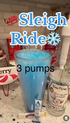 a blue drink sitting on top of a counter