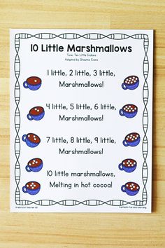 the ten little marshmallows worksheet is displayed on a wooden surface