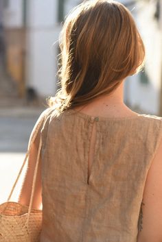 Style // A beautiful brown linen top, the perfect addition to any wardrobe The Mila Top is the perfect effortless and minimal design for the ultimate laid back look. A high neck sleeveless linen top, featuring a mother of pearl button on the back. The rounded neckline can be dressed up or down, making it your new go to top Fabric Note // Made in Italy from 100% Linen Sizing Advice // Available in three sizes, S: Bust: 36" Length: 20" M: Bust: 38" Length: 21" L: Bust: 40" Length: 22" Care Instruc Sleeveless Brown Linen Top, Brown Sleeveless Linen Top, Linen Tops, Linen Top Women, Clothes Basket, High Neck Sleeveless, Linen Set, Rounded Neckline, Black White Pink