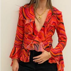 Ronny Kobo Alisha Top In Sunkissed Swirl. Ruffle Sleeves. V Neck With Ruffle Details In Front And Back. Button Closure. Semi Sheer. Wore Once. Absolutely Beautiful Ronny Kobo, Ruffle Sleeves, Orange Pink, Pink And Orange, Swirl, Top Blouse, Womens Tops, V Neck, Orange