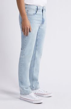 A faded light wash adds casual-cool, vintage-inspired style to soft, stretchy jeans in a modern straight-leg profile. 32" inseam; 16" leg opening; 10 1/2" front rise; 15" back rise (size 32) Zip fly with button closure Five-pocket style 92% cotton, 6% polyester, 2% elastane Machine wash, dry flat Imported Light Wash Fitted Straight Jeans, Fitted Light Wash Straight Jeans, Light Wash Bottoms With Straight Fit And Hem, Light Wash Flare Jeans With Straight Hem, Washed Blue Straight Jeans, Faded Straight Bottoms For Spring, Straight Faded Bottoms For Spring, Light Wash Straight Fit Bottoms With Standard Cut Leg, Classic Light Wash Straight Fit Flare Jeans