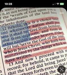 an open bible with the american flag painted on it's page and words below