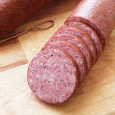 the sausage is sliced and ready to be cooked