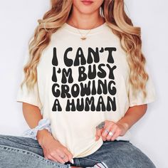 "Comfort Colors Shirt, I Can't I'm Busy Growing A Human, First Time Mom Gift, Pregnancy Reveal Shirt, Mama Shirt, Mom Shirt, Pregnant Mom Tee W H Y - S H O P - W I T H - S W E E T T C A P R I ? Thank you for stopping by! I'm Cassie and everything in my shop is made entirely by myself. I take pride in good quality, excellent customer service, and affordable prices. This is a Comfort Colors tee, one of my favorites... Amazing quality, soft & comfortable. My products are made with a high quality he Social Justice Shirts, Auntie Era, Counselor Shirt, Pregnancy Reveal Shirt, Auntie Shirts, New Aunt, First Time Mom, Sped Teacher, Aunt Shirts