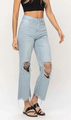 These versatile, vintage jeans are designed with a high waisted, relaxed fit and cropped length. Crafted with non-stretch denim and detailed with distressed elements for an authentic, rigid texture. The wide-leg and flare jean design is perfect for giving any look a 90's edge. F. RISE: 11 3/8" / INSEAM: 27'' / LEG OPENING: 19 1/2''*Wash and distressing will vary with each pair. MODEL IS 5' 9'' WEARING SIZE 26 Crop Flare Jeans, Blue Flare Jeans, Crop Flare, Flying Monkey Jeans, Cropped Flare Jeans, Cropped Flares, Jeans Online, Denim Flares, Designer Jeans