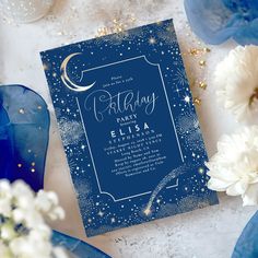 a blue and white birthday party card with stars, moon and sparkles on it